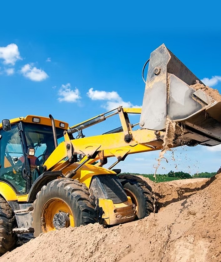 Fosse septique installée avec couvercles verts et conduites prêtes au raccordement à Saint-Hyacinthe